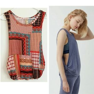 Open arms orange printed tank top by Scotty M